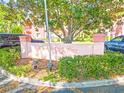 Welcome to Magnolia Place, a beautiful community with lush landscaping and mature trees at 5500 Longwood Run Blvd # 201, Sarasota, FL 34243