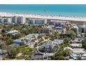 Aerial view showcasing property's prime location near a beautiful beach and nearby attractions at 5512 Avenida Del Mare, Sarasota, FL 34242