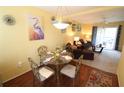 Cozy living area with dining space, comfortable seating and plenty of natural light at 1815 Restful Dr # N-27, Bradenton, FL 34207