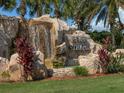 Community entrance sign with waterfall feature at 6611 Grand Estuary Trl # 105, Bradenton, FL 34212