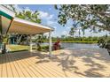 Spacious waterfront deck perfect for entertaining or enjoying the tranquil river views at 6737 Lincoln Rd, Bradenton, FL 34203