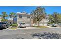 Exterior of a well-maintained townhome with multiple car garages and driveway parking at 7687 Sweetbay Cir # 7687, Bradenton, FL 34203