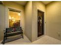 Cozy front porch with a bench, perfect for relaxing and enjoying the neighborhood views at 3520 Woodmont Dr, Parrish, FL 34219