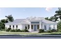 Beautiful single story home boasting a stylish light gray metal roof and inviting front entry with a blue door at 2508 Belvoir Blvd, Sarasota, FL 34237