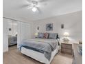 Cozy bedroom with light wood floors and a large closet at 204 46Th Avenue W Ter # 412, Bradenton, FL 34207