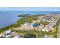 Scenic aerial view of a waterfront community with stunning bay views at 5203 Title Row Dr, Bradenton, FL 34210