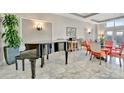 Comfortable common area with piano and ample seating, perfect for socializing at 808 3Rd W Ave # 214, Bradenton, FL 34205