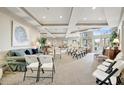 Spacious community meeting room with comfortable seating and abundant natural light at 808 3Rd W Ave # 214, Bradenton, FL 34205