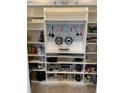 Spacious pantry with organized shelving, perfect for storing kitchen essentials and keeping the area tidy at 10668 Lake Montauk Dr, Riverview, FL 33578