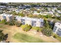 Aerial shot of a condo building with views of a golf course at 3620 Ironwood Cir # 606, Bradenton, FL 34209