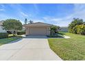 Well-maintained home with a spacious driveway and two car garage at 7116 Drewrys Blf, Bradenton, FL 34203