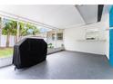 Partially covered patio with plenty of space; great for entertaining at 2225 Alice Rd, Sarasota, FL 34231