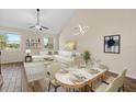 Inviting living and dining area with stylish furnishings, providing a comfortable and elegant living space at 3664 Course Dr, Sarasota, FL 34232