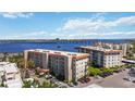 Waterfront condo building with well-maintained landscaping and ample parking, offering stunning water views and coastal living at 1650 1St W Ave # 503B, Bradenton, FL 34205