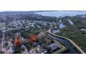 Scenic aerial view showcases the property's location near a waterfront and natural reserves at 3811 30Th S Ave, St Petersburg, FL 33711