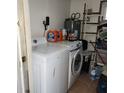 Functional laundry room with modern washer and dryer at 4070 Grobe St, North Port, FL 34287