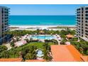 Resort-style pool area overlooking the ocean, perfect for relaxation and recreation at 1281 Gulf Of Mexico Dr # 704, Longboat Key, FL 34228
