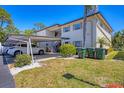 Charming condo building with well-maintained landscaping at 2839 Swifton Dr # 28, Sarasota, FL 34231