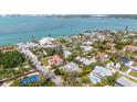 Aerial view of the home in a neighborhood with proximity to the ocean and local amenities at 3455 Flamingo Ave, Sarasota, FL 34242
