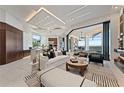 Open living space with waterfront views, modern furnishings and stylish decor at 800 Blue Shell Loop, Sarasota, FL 34240