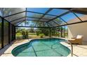 Enjoy this screened-in pool with tranquil views of the backyard at 914 82Nd Nw St, Bradenton, FL 34209