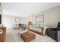 Inviting living room featuring modern furnishings and bright, neutral décor at 3006 Caring Way # 210, Port Charlotte, FL 33952
