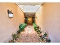 Inviting walkway featuring manicured landscaping, creating a warm welcome to the units at 4069 Overture Cir # 341, Bradenton, FL 34209