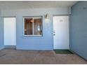 Inviting condo entrance with a window and a view, next to the unit door at 5300 Gulf Dr # 204, Holmes Beach, FL 34217