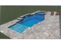 A spacious swimming pool featuring sleek tiling and modern design at 9410 Bluefin Ter, Bradenton, FL 34209