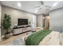 Cozy bedroom with ceiling fan, soft lighting, and neutral decor at 4850 51St W St # 4205, Bradenton, FL 34210