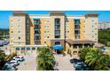 Stunning condo exterior with a grand entrance and ample parking at 1064 N Tamiami Trl # 1604, Sarasota, FL 34236