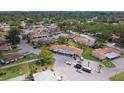 Serene aerial view of the community featuring lush greenery and well-maintained buildings at 5053 Live Oak Cir, Bradenton, FL 34207