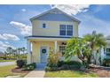 Inviting two-story home with covered front porch and lush landscaping at 5532 River Sound Ter, Bradenton, FL 34208