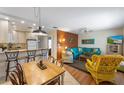Bright living room with island themed decorations and an open floor plan at 117 7Th N St # 35, Bradenton Beach, FL 34217