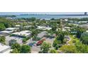 Beautiful aerial view showing the property and surrounding neighborhood near a bay and featuring a view of the city at 1186 Center Pl, Sarasota, FL 34236