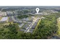 Aerial view of the neighborhood showcasing the community's layout and surrounding greenery at 11435 Apple Tree Cir, Bradenton, FL 34211