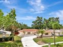 Beautiful single-story home boasting a long driveway and well-maintained landscaping at 2924 Valley Forge St, Sarasota, FL 34231