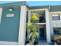 Inviting condo exterior showcases a well-maintained facade, lush landscaping, and a welcoming entrance at 4325 46Th W Ave # 202, Bradenton, FL 34210