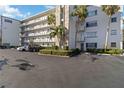 Condo building exterior with modern architecture and parking area at 4440 Ironwood Cir # 508D, Bradenton, FL 34209