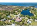 An idyllic coastal community featuring a stunning house, private pool and lush greenery, all alongside picturesque waterways at 4711 17Th W St, Palmetto, FL 34221