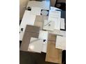 Selection of tiles, countertops, and cabinet finishes showcase the design possibilities for a personalized kitchen and bath at 1019 Tideline Cv, Bradenton, FL 34209