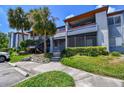 Inviting condo exterior featuring lush greenery, creating a serene and appealing atmosphere for residents at 10265 Gandy N Blvd # 1004, St Petersburg, FL 33702
