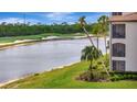Wonderful exterior view from the screened in lanai of the golf course and lake at 17118 Vardon Ter # 101, Bradenton, FL 34211