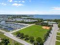 Stunning aerial view of marina, park, and waterfront homes at 6732 Washington Pl, Bradenton, FL 34207