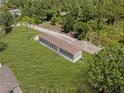 Home with a well-kept lawn, featuring a clean roof and an efficient layout at 8414 Sweden Blvd, Punta Gorda, FL 33982