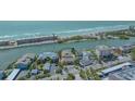Picturesque waterfront home situated alongside a tranquil canal with convenient beach access at 9034 Midnight Pass Rd # 6, Sarasota, FL 34242