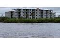 New condo construction featuring multiple units with water view at 1030 Tidewater Shores Loop # 404, Bradenton, FL 34208
