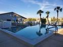 Inviting community pool with sparkling water and serene lakeside views at 3368 Lake Bayshore Dr # 217 Building P, Bradenton, FL 34205