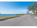 Scenic waterfront view of the community, showcasing the tranquil ocean and beautiful coastal landscape at 337 Somerset Ave, Sarasota, FL 34243