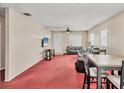 Spacious living room with comfortable seating and a ceiling fan to keep you cool at 2715 52Nd Avenue W Ter, Bradenton, FL 34207